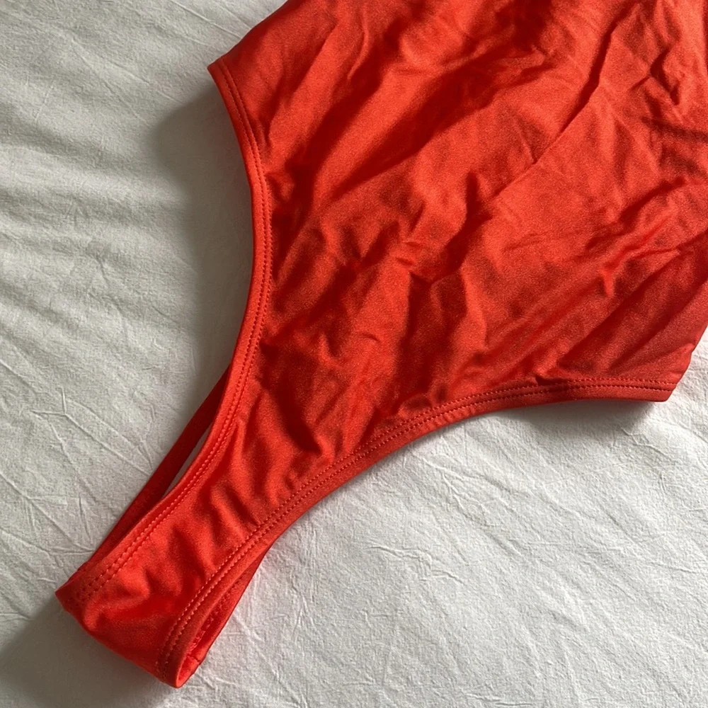 Glamorous bright orange one piece bathing suit